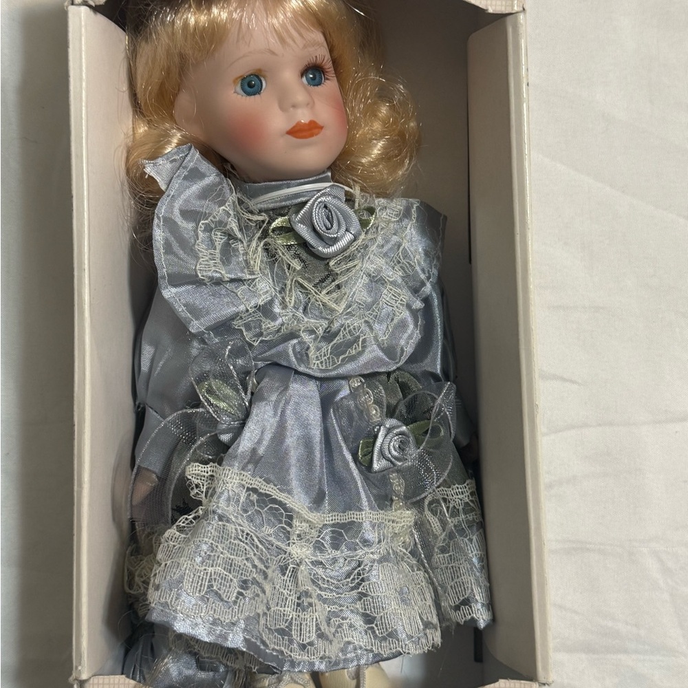 Porcelain Doll in Shimmery Light Gray Lace Dress